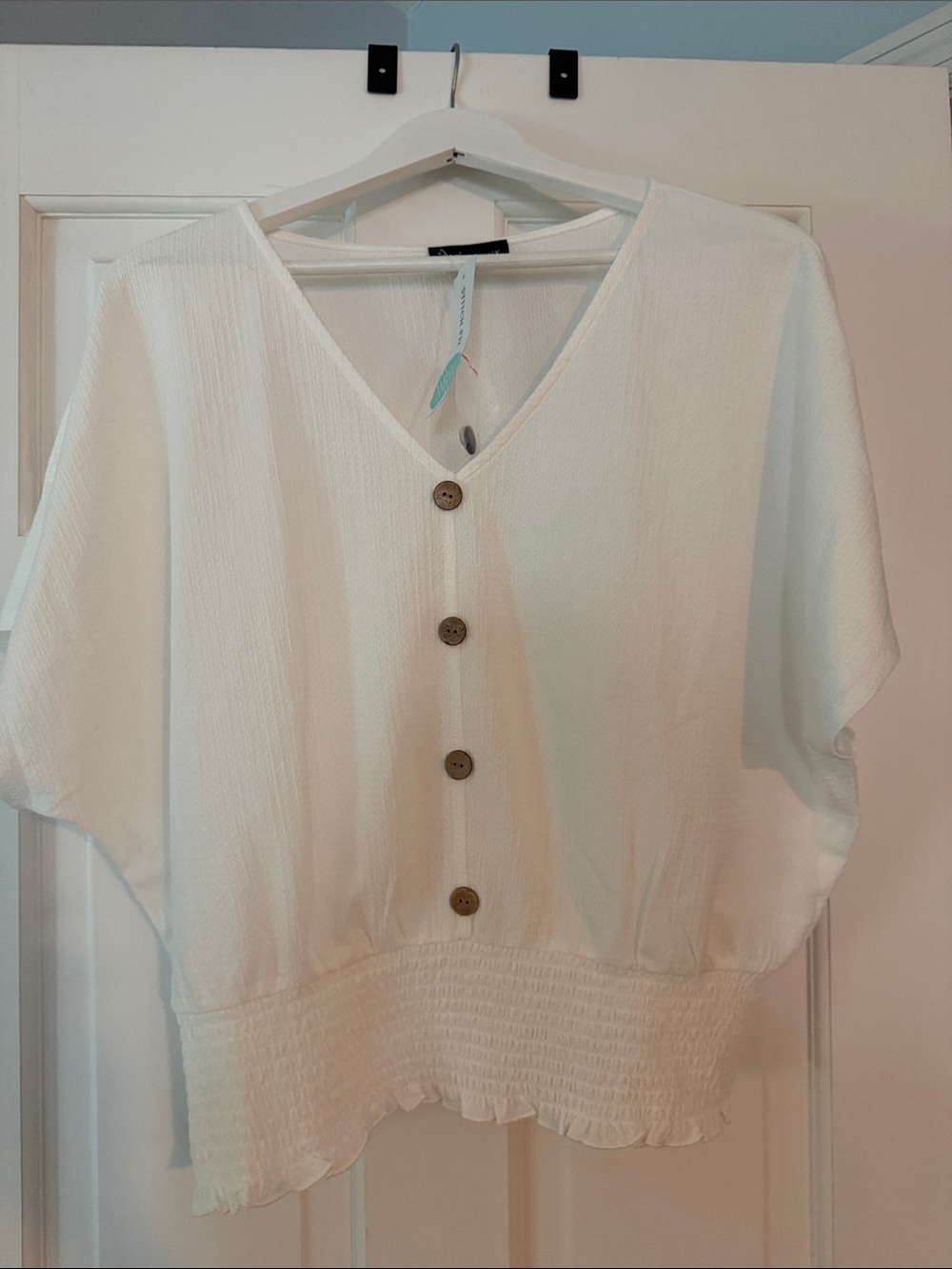 White Button-Front V-Neck Blouse with Smocked Hem. NWT